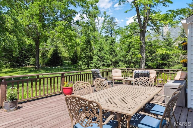 1843 Manor Hill Rd, Saint Louis, MO 63131 - wooden deck featuring a yard, outdoor dining space, and view of scattered trees
