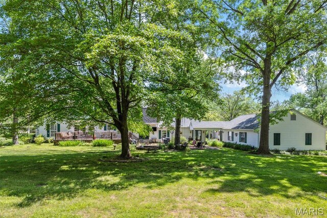 1843 Manor Hill Rd, Saint Louis, MO 63131 - view of grassy yard with a wooden deck