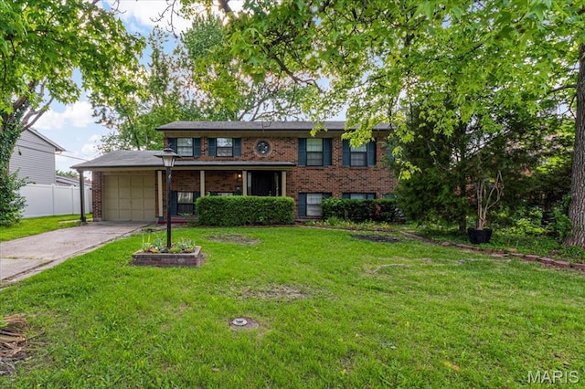 2145 Glenoro Dr, Florissant, MO 63033 - view of front of property with brick siding, an attached garage, and driveway