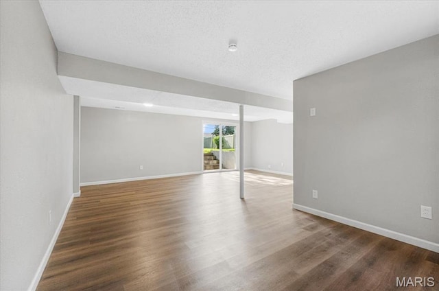 2145 Glenoro Dr, Florissant, MO 63033 - unfurnished room with wood finished floors and baseboards