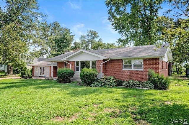 9506 B Rd, Valmeyer, IL 62295 - single story home with brick siding, a front lawn, and french doors