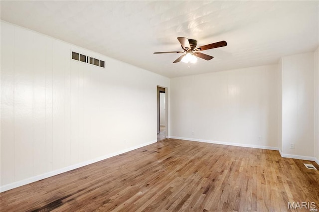 9506 B Rd, Valmeyer, IL 62295 - empty room with ceiling fan, wood finished floors, and baseboards