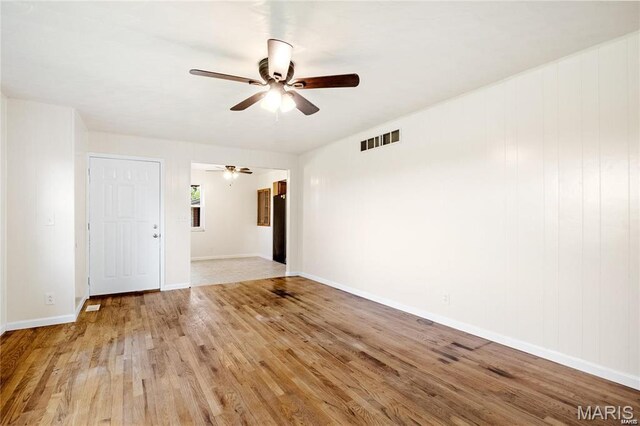 9506 B Rd, Valmeyer, IL 62295 - empty room with a ceiling fan, wood finished floors, and baseboards