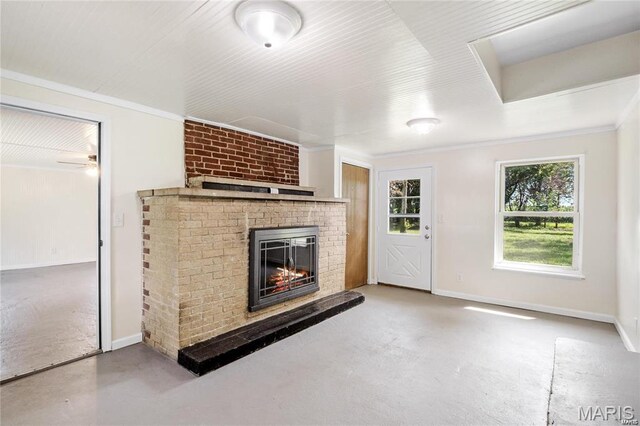 9506 B Rd, Valmeyer, IL 62295 - unfurnished living room featuring concrete floors, a fireplace, ornamental molding, a ceiling fan, and baseboards