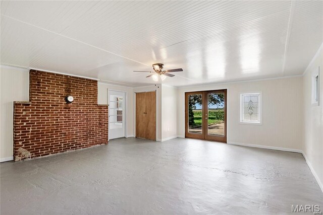9506 B Rd, Valmeyer, IL 62295 - unfurnished living room with ceiling fan, brick wall, concrete flooring, ornamental molding, and baseboards