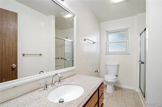 9506 B Rd, Valmeyer, IL 62295 - full bathroom featuring a shower stall, vanity, toilet, and tile walls