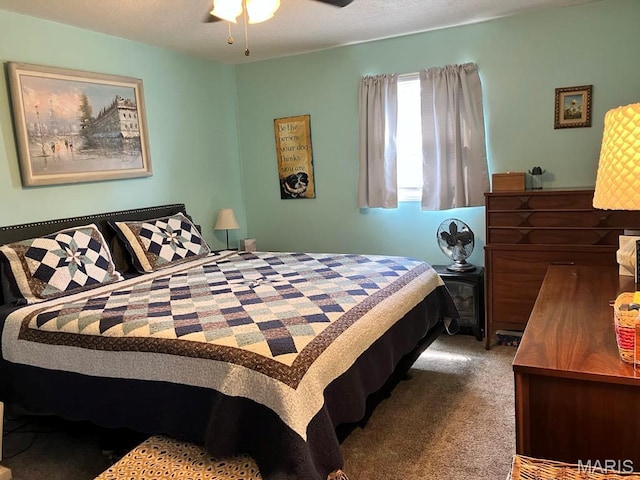 carpeted bedroom with a ceiling fan