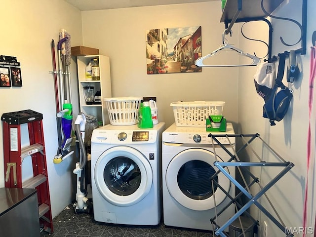 washroom featuring independent washer and dryer
