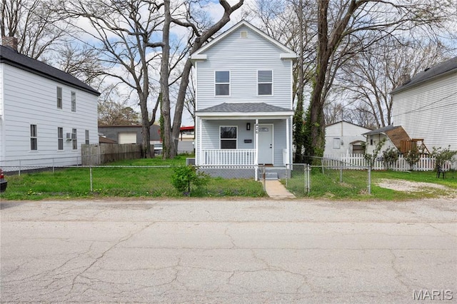 view of front of house featuring a porch and a gate