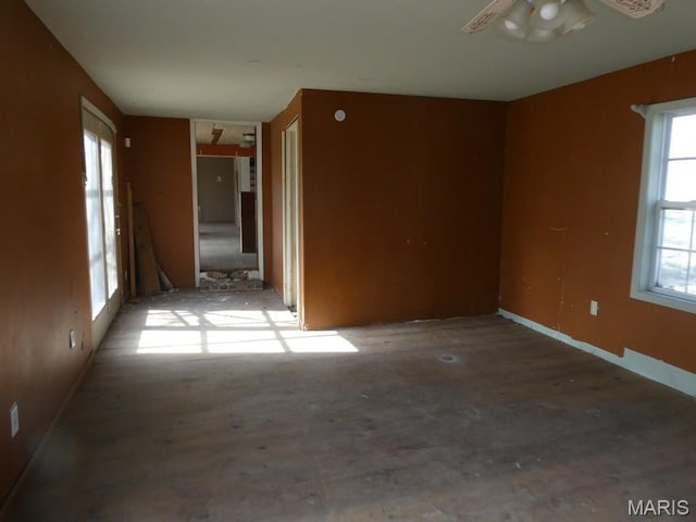 309 Talmadge St, Witt, IL 62094 - unfurnished room featuring a ceiling fan and wood finished floors