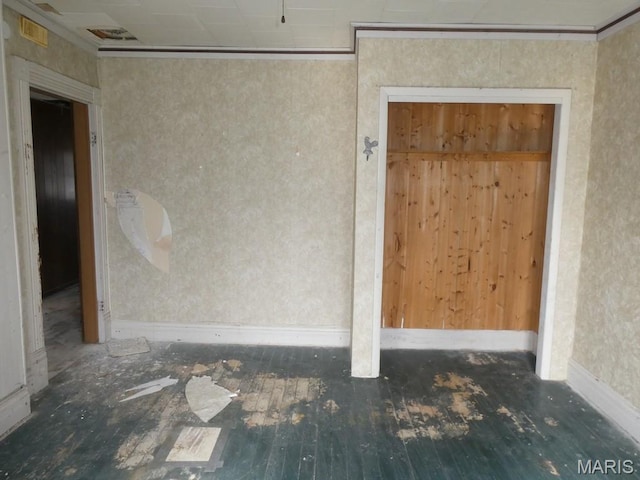 309 Talmadge St, Witt, IL 62094 - spare room featuring baseboards and hardwood / wood-style flooring