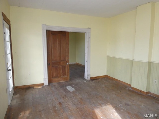 309 Talmadge St, Witt, IL 62094 - unfurnished room with wood-type flooring and baseboards