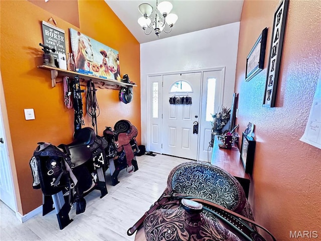 127 Kehner Rd, Steelville, MO 65565 - foyer with wood finished floors, a chandelier, and vaulted ceiling