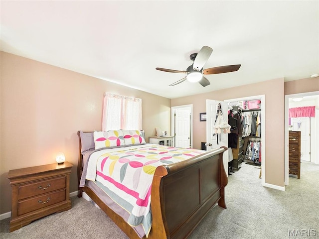 127 Kehner Rd, Steelville, MO 65565 - bedroom featuring light carpet, a closet, baseboards, and a spacious closet