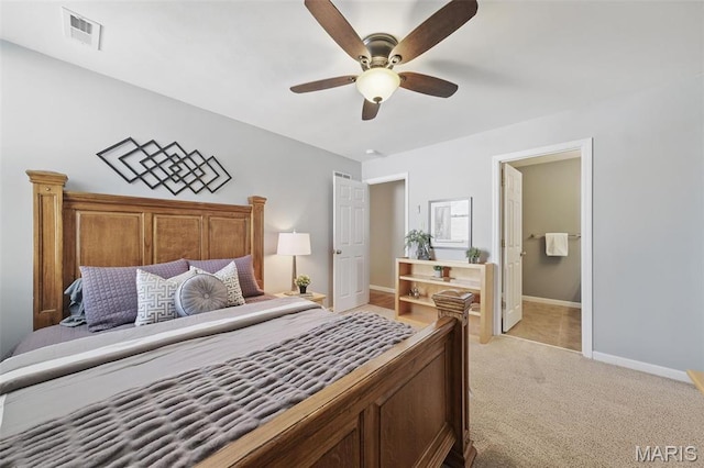 bedroom with light carpet, baseboards, and ceiling fan