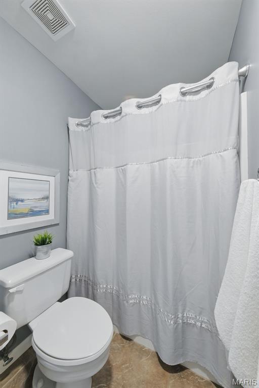 full bathroom with toilet
