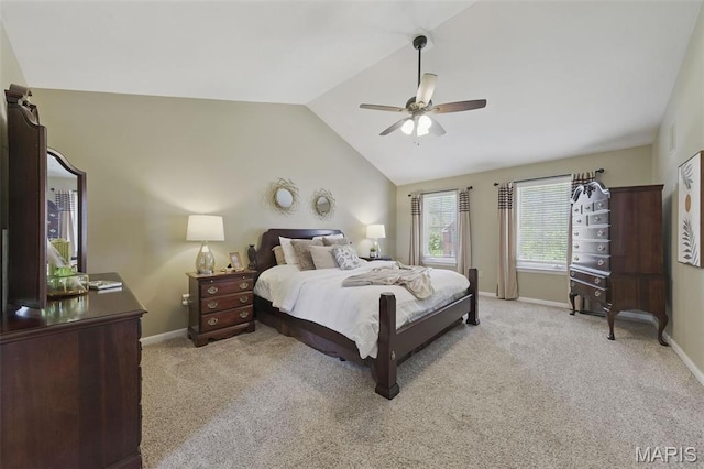 bedroom featuring vaulted ceiling, baseboards, light carpet, and ceiling fan