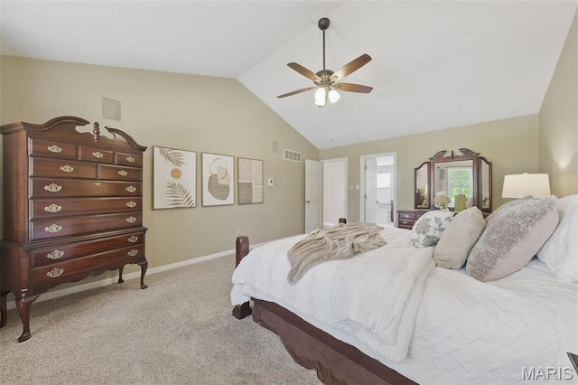bedroom with vaulted ceiling, light colored carpet, baseboards, and ceiling fan