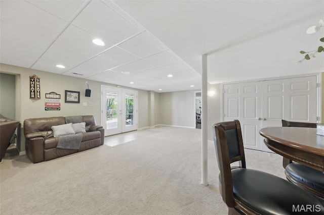living area with carpet, french doors, recessed lighting, and baseboards
