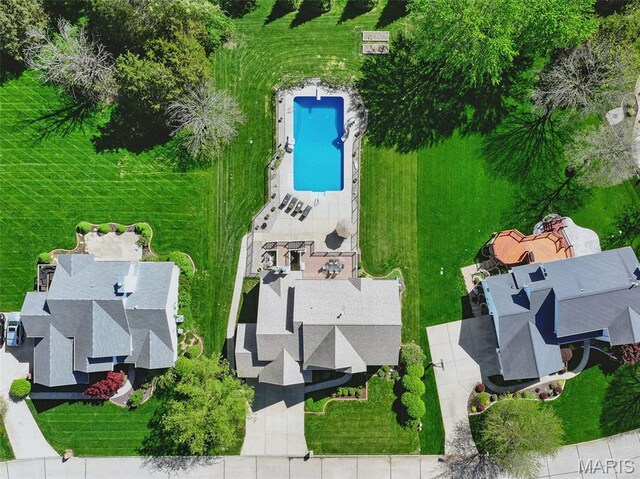drone / aerial view of a pool area