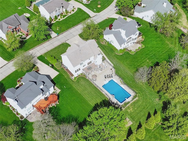 aerial view of residential area featuring a pool area