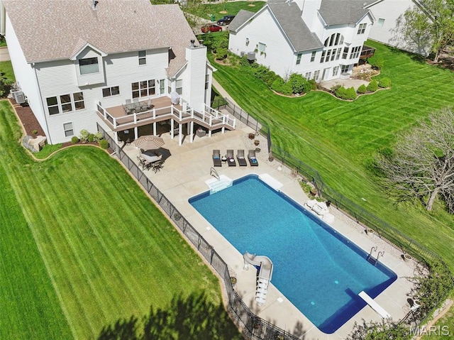 back of property featuring central air condition unit, a patio area, and a deck