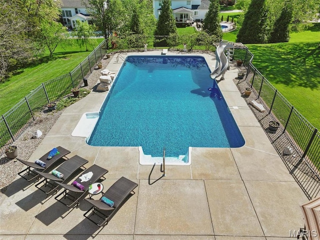 view of pool featuring a water slide and a patio