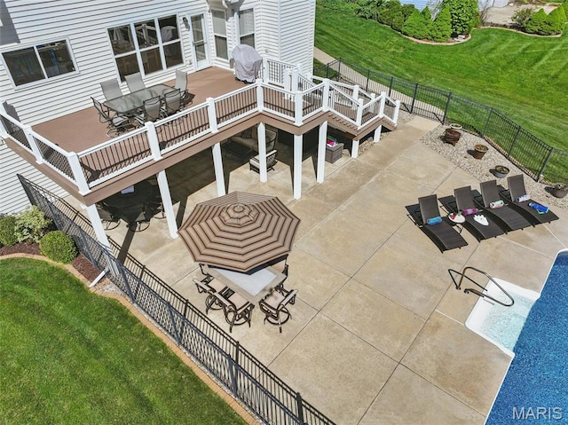 view of patio / terrace with a wooden deck and outdoor dining area