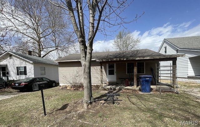 view of front of home featuring a shingled roof