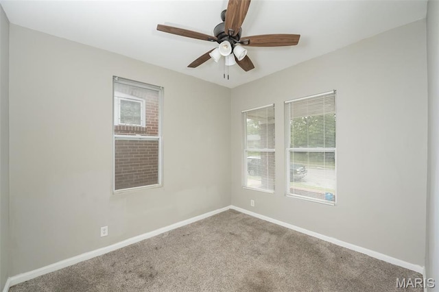 6211 Idaho Ave, Saint Louis, MO 63111 - carpeted spare room with baseboards and ceiling fan