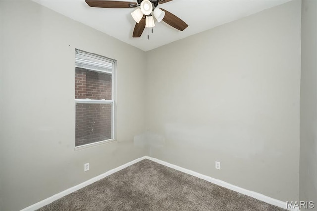 6211 Idaho Ave, Saint Louis, MO 63111 - empty room with carpet flooring, baseboards, and a ceiling fan
