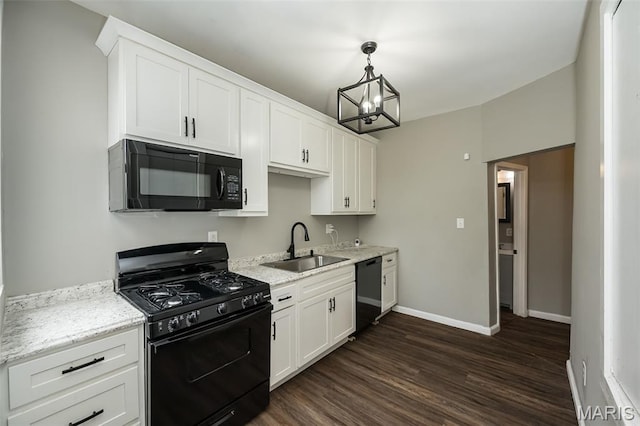 6211 Idaho Ave, Saint Louis, MO 63111 - kitchen with black appliances, a sink, dark wood finished floors, and white cabinets