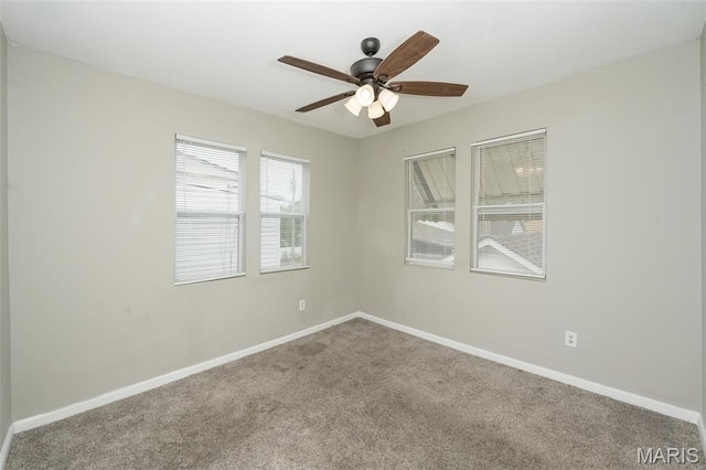 6211 Idaho Ave, Saint Louis, MO 63111 - spare room with carpet, baseboards, and ceiling fan