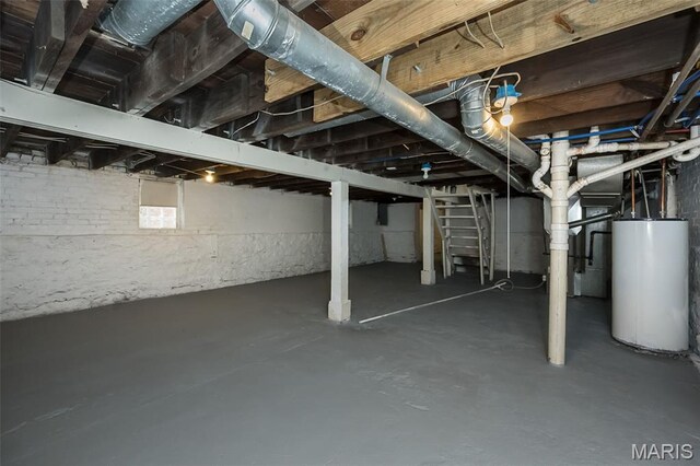 6211 Idaho Ave, Saint Louis, MO 63111 - basement with water heater and stairway