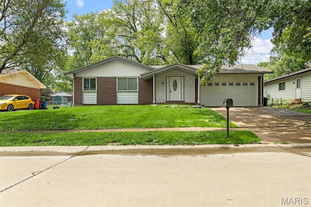 1455 Burnside Ct, Florissant, MO 63031 - view of front of house featuring concrete driveway, a garage, board and batten siding, brick siding, and a front lawn