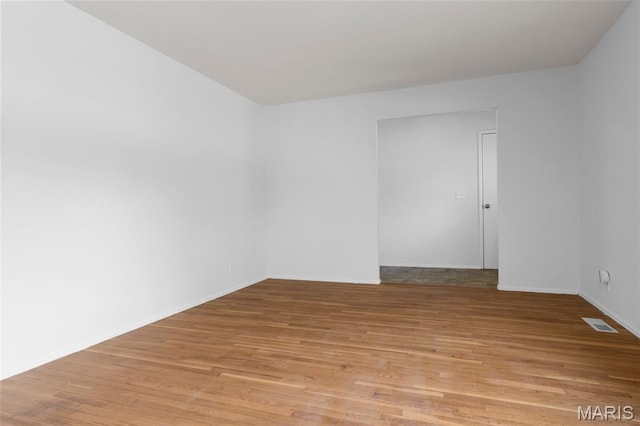 1455 Burnside Ct, Florissant, MO 63031 - unfurnished room with light wood finished floors and baseboards