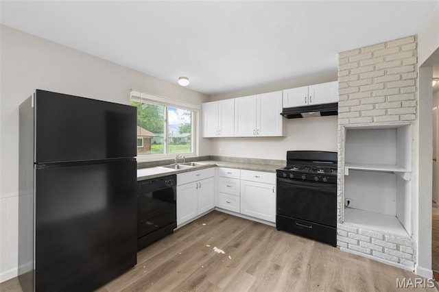 1455 Burnside Ct, Florissant, MO 63031 - kitchen featuring black appliances, under cabinet range hood, white cabinets, light wood-type flooring, and a sink