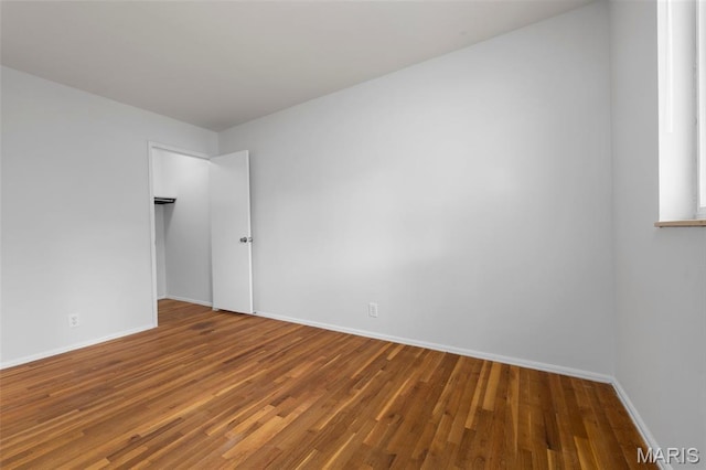 1455 Burnside Ct, Florissant, MO 63031 - unfurnished room with wood finished floors and baseboards