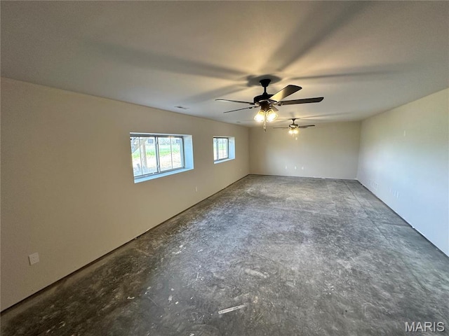 624 Glendale Dr, Troy, IL 62294 - empty room featuring ceiling fan and concrete floors