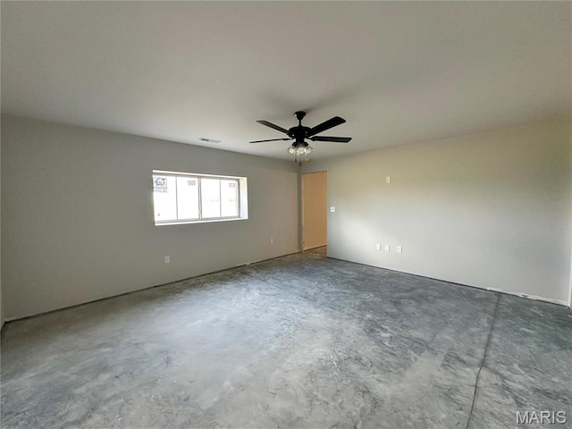 624 Glendale Dr, Troy, IL 62294 - spare room featuring unfinished concrete flooring and ceiling fan