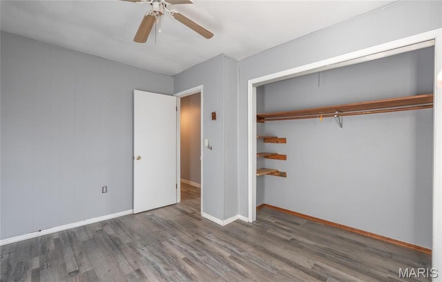 11 Saint Ann Ave, St James, MO 65559 - unfurnished bedroom featuring wood finished floors, a closet, baseboards, and ceiling fan