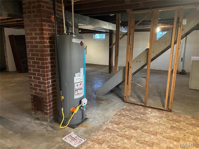 127 Whitelaw Ave, East Alton, IL 62024 - below grade area with gas water heater and stairs
