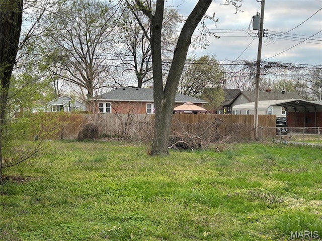 127 Whitelaw Ave, East Alton, IL 62024 - view of yard with fence and a detached carport