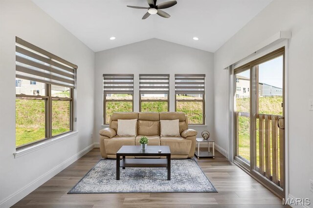 536 Edison Way, Wentzville, MO 63385 - living area with plenty of natural light, ceiling fan, lofted ceiling, baseboards, and wood finished floors