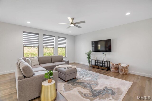 536 Edison Way, Wentzville, MO 63385 - living area with a ceiling fan, recessed lighting, baseboards, and wood finished floors