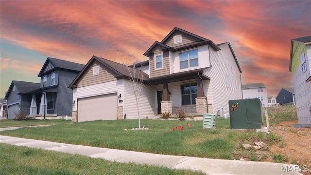 536 Edison Way, Wentzville, MO 63385 - craftsman-style house featuring stone siding, a front lawn, and covered porch