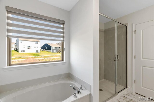 536 Edison Way, Wentzville, MO 63385 - bathroom with plenty of natural light, a garden tub, and a shower stall