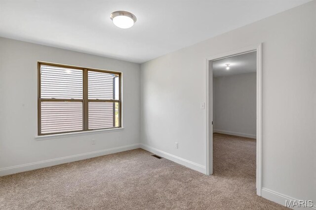 536 Edison Way, Wentzville, MO 63385 - unfurnished room with carpet flooring and baseboards