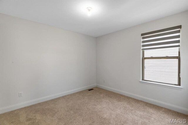 536 Edison Way, Wentzville, MO 63385 - carpeted spare room featuring baseboards