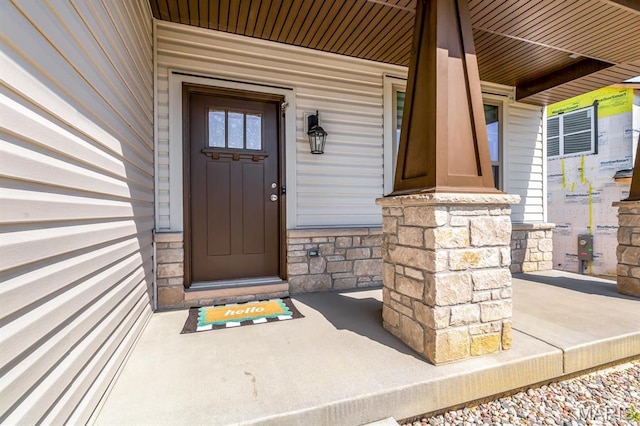 536 Edison Way, Wentzville, MO 63385 - view of exterior entry with covered porch and stone siding